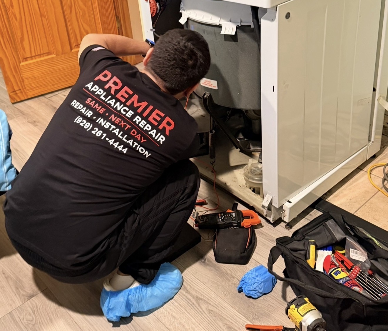 Badma Premier Appliance Repair technician working on Samsung washer Pleasant Plains Princes Bay Staten Island 10309 Woodrow Road